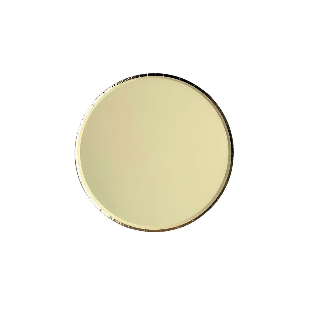 Round gold rimmed yellow plate on a white background