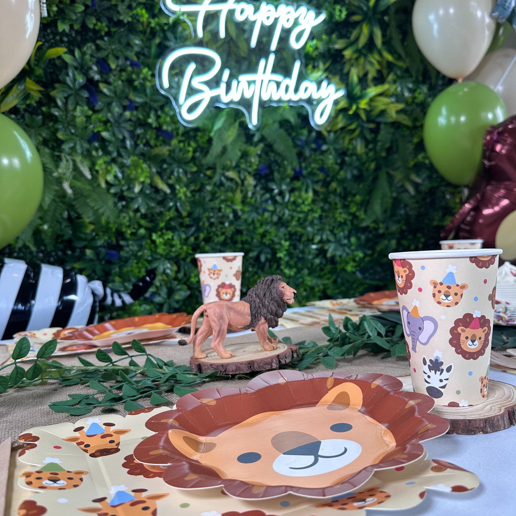 Safari-themed birthday party pack with plates, napkins, and balloons by Festive Fun Co.