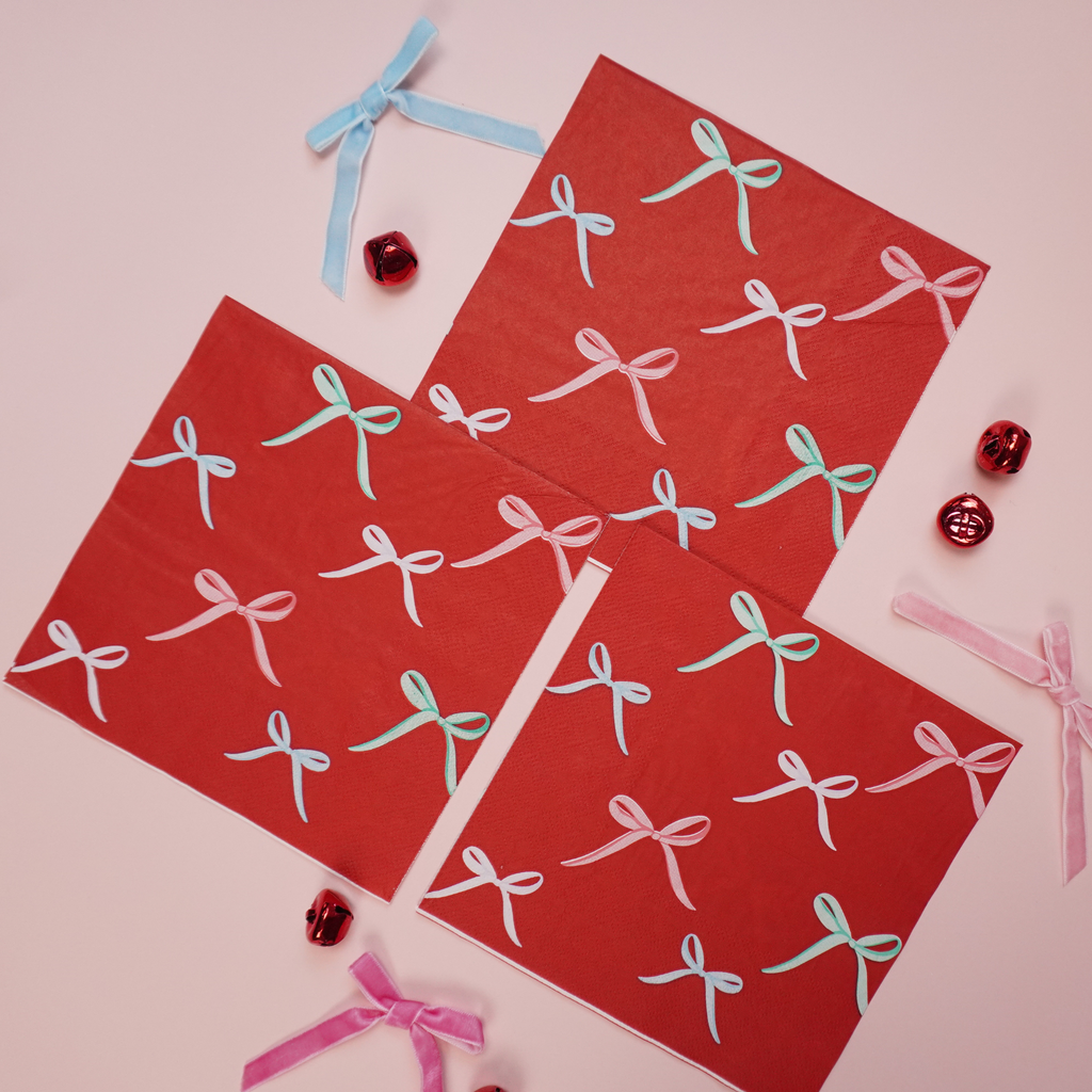 Red and burgundy bow-themed napkins by Festive Fun Co.