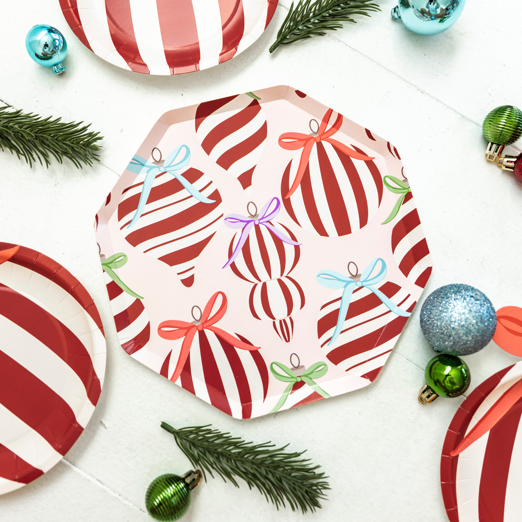 Holiday paper plates with ornament and bow design by Festive Fun Co.