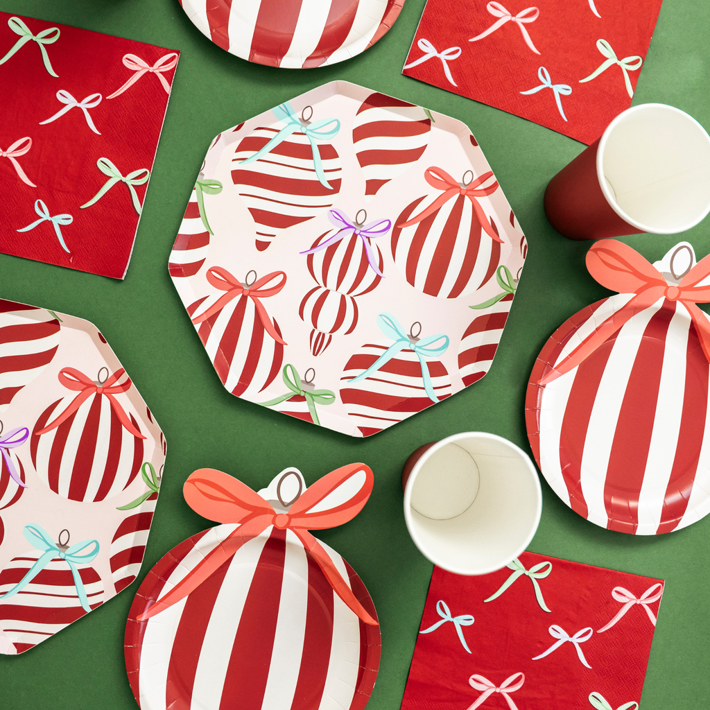 Holiday paper plates with ornament and bow design by Festive Fun Co.