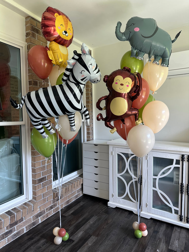 Safari animal balloon set with elephant, lion, monkey, and zebra by Festive Fun Co.