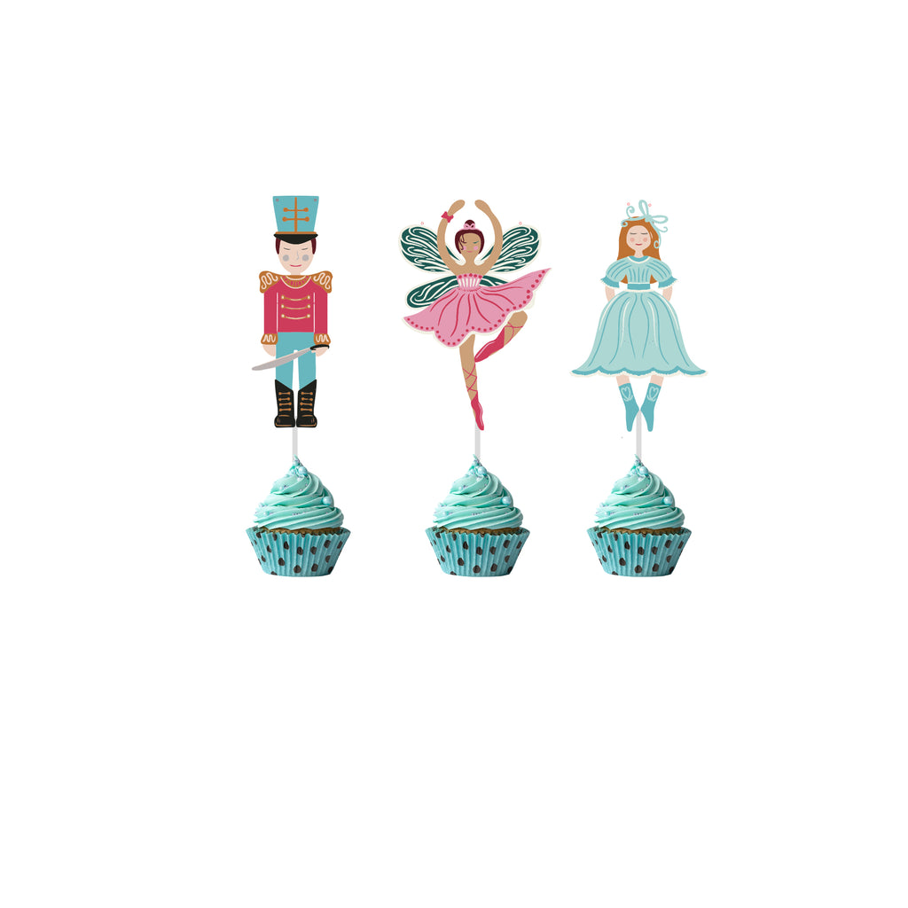 Three cupcake toppers featuring a nutcracker, fairy, and princess on a white background.